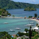 Labuan Bajo coastline with islands and boats.