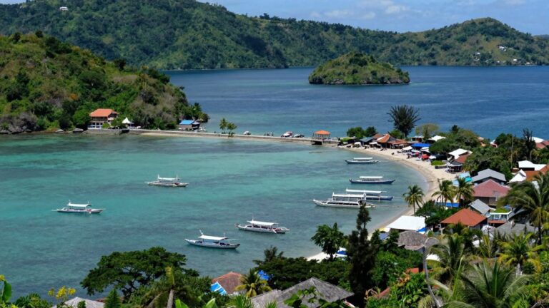 Labuan Bajo coastline with islands and boats.